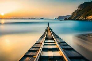 a long exposure photograph of a train track leading to the ocean. AI-Generated photo