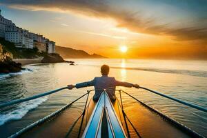 un hombre es sentado en el arco de un barco a puesta de sol. generado por ai foto