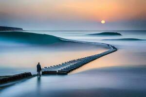 a man stands on a pier looking at the sun setting over the ocean. AI-Generated photo