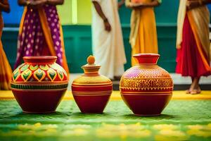 three colorful vases on a green carpet. AI-Generated photo