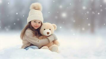 Little girl and toy teddy bear on snow field. Friendship, best friend concept. photo