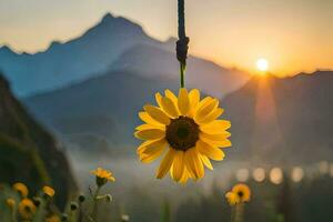 sunflower hanging from a rope in front of mountains. AI-Generated photo
