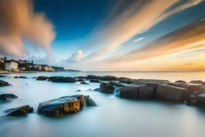 a long exposure photograph of rocks and water at sunset. AI-Generated photo