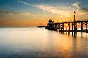 un largo exposición fotografía de un muelle a puesta de sol. generado por ai foto