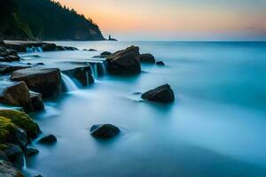 a long exposure photograph of rocks and water at sunset. AI-Generated photo