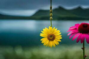 two flowers hanging from a string near a lake. AI-Generated photo