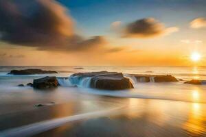 a beautiful sunset over the ocean with waves crashing into rocks. AI-Generated photo