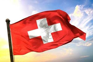 Switzerland 3D rendering flag waving isolated sky and cloud background photo