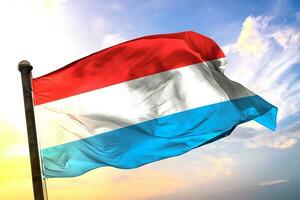 Luxembourg 3D rendering flag waving isolated sky and cloud background photo