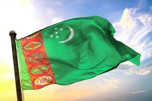 Turkmenistan  3D rendering flag waving isolated sky and cloud background photo
