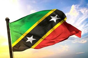 Saint-Kitts-and-Nevis 3D rendering flag waving isolated sky and cloud background photo