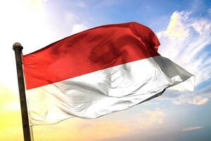 Indonesia 3d representación bandera ondulación aislado cielo y nube antecedentes foto