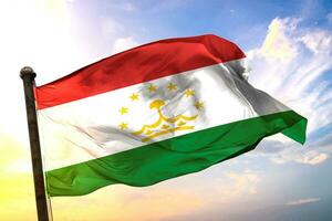 Tajikistan 3D rendering flag waving isolated sky and cloud background photo