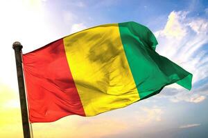Guinea 3D rendering flag waving isolated sky and cloud background photo