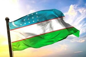 Uzbekistan. 3D rendering flag waving isolated sky and cloud background photo