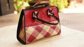Handicrafts made from pandanus can be in the form of bags, mats and hats. This craft is a typical souvenir of the island of Bawean, East Java photo