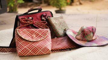 Handicrafts made from pandanus can be in the form of bags, mats and hats. This craft is a typical souvenir of the island of Bawean, East Java photo