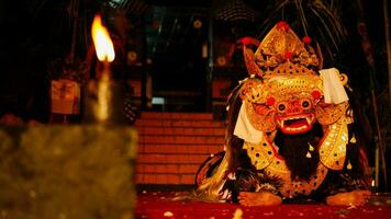 Barong dance staged to celebrate Saraswati's feast day, night day. Balinese dance and dancer, spooky photo