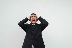 Portrait Young Asian businessman stress, dizziness, headache isolated on white background photo