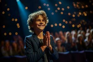 A talented child actor taking a final bow eliciting a standing ovation from the audience photo