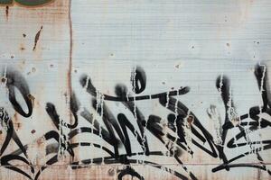 Cracked and abstract grunge texture. Aged material surface backdrop. Weathered effect pattern. Old and dirty background. photo