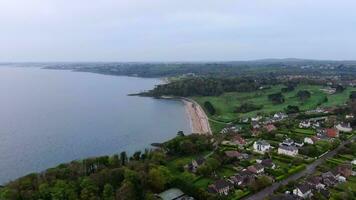 Aerial view on coast of sea at sunset in Helens Bay, Northern Ireland, UK. video