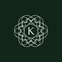 Initial letter K floral ornamental border circle frame logo vector