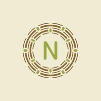 Initial letter N ornamental border circle frame logo vector