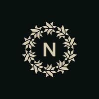 Initial letter N ornamental border circle frame logo vector