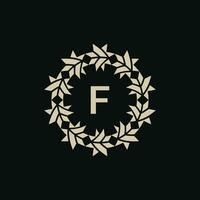 inicial letra F ornamental frontera circulo marco logo vector
