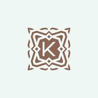 Initial letter K emblem logo. ornamental abstract star pattern frame logo vector