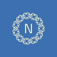 initial letter N ornamental emblem frame circle pattern logo vector