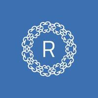 initial letter R ornamental emblem frame circle pattern logo vector