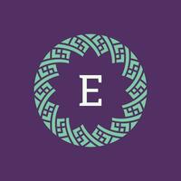 initial letter E ornamental emblem frame circle pattern logo vector