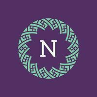 initial letter N ornamental emblem frame circle pattern logo vector