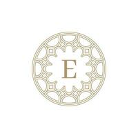 initial letter E ornamental emblem frame circle pattern logo vector