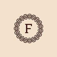 simple and elegant initial letter F ornamental circle frame logo vector