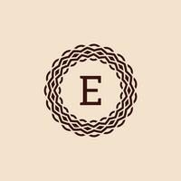 simple and elegant initial letter E ornamental circle frame logo vector