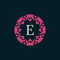 simple and elegant initial letter E floral ornamental circle frame logo vector