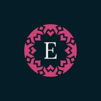 simple and elegant initial letter E floral ornamental circle frame logo vector