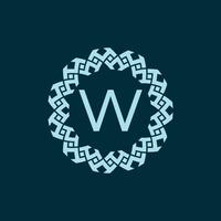 initial letter W ornamental emblem frame circle pattern logo vector