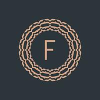initial letter F ornamental emblem frame circle pattern logo vector
