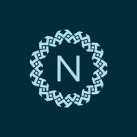 initial letter N ornamental emblem frame circle pattern logo vector