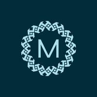 initial letter M ornamental emblem frame circle pattern logo vector