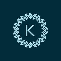 initial letter K ornamental emblem frame circle pattern logo vector