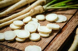 Chopped parsley root. On table photo