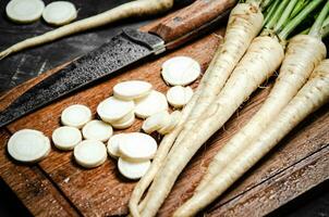 Chopped parsley root. On table photo