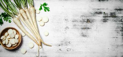 Chopped parsley root. On table photo