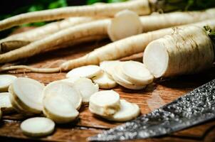 Chopped parsley root. On table photo