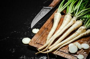 Chopped parsley root. On table photo